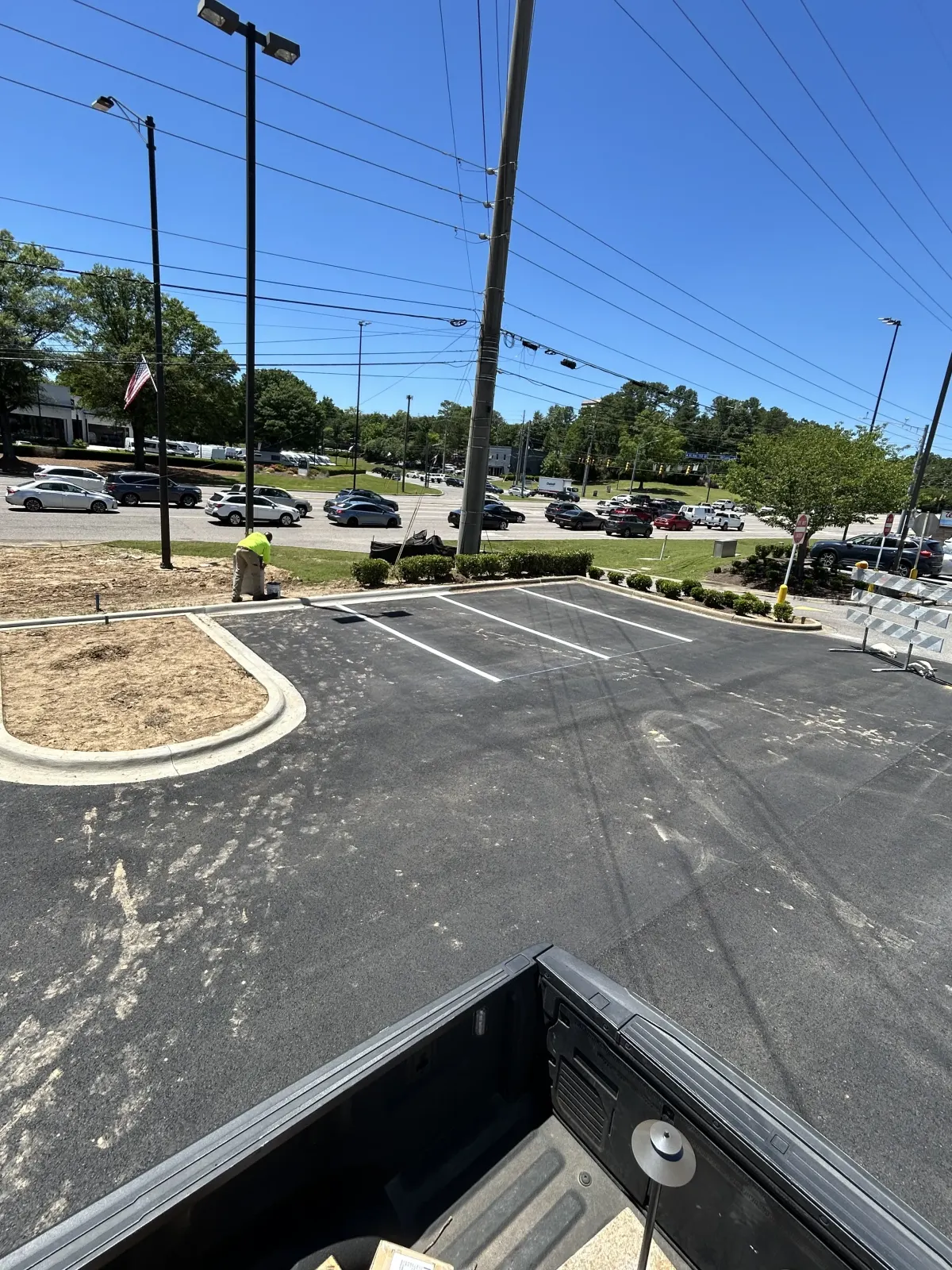 Retail parking lot with brand new white stall lines